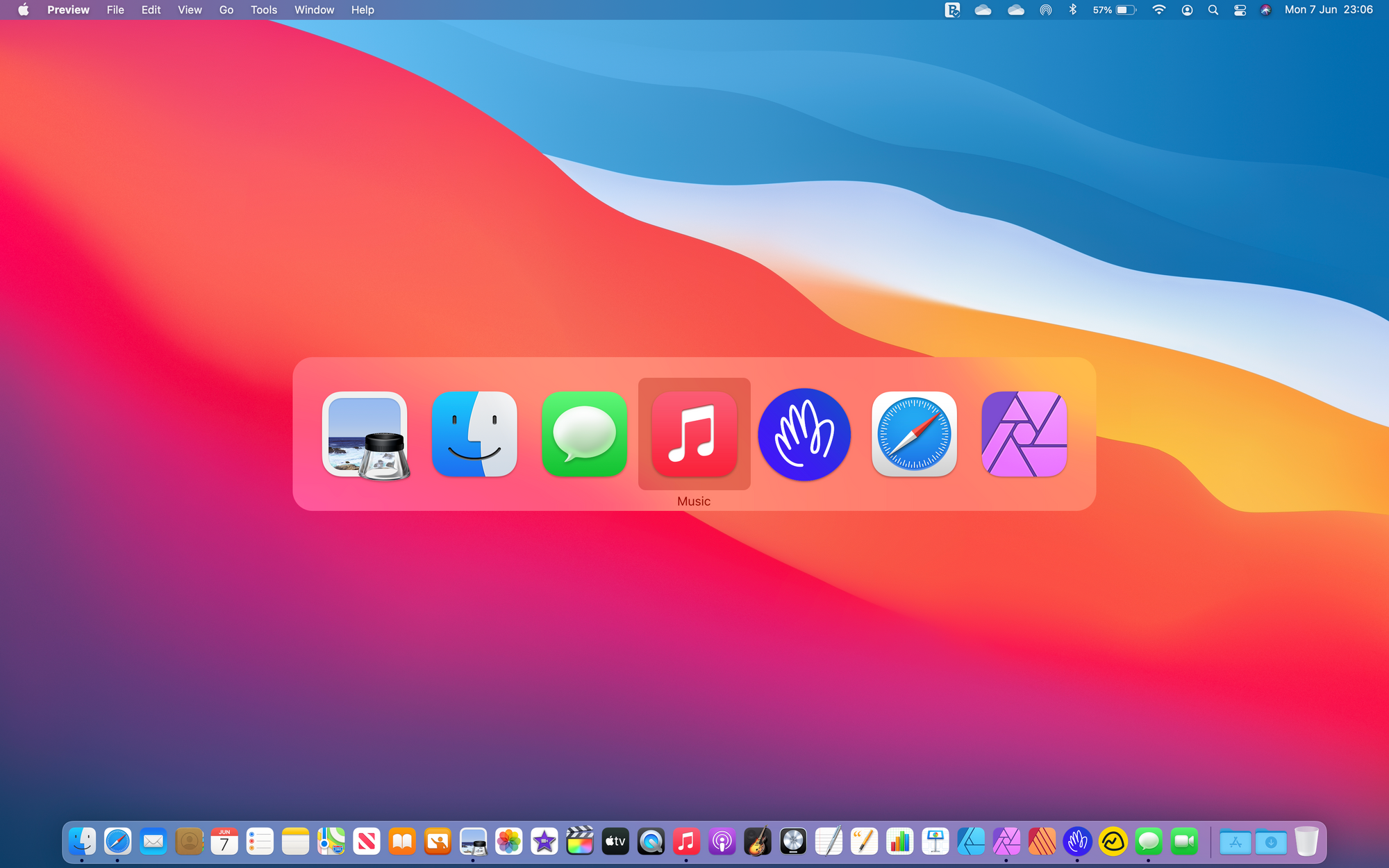 The application switcher menu showing the Music application selected.